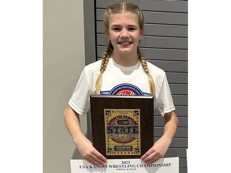 Russell Wrestling Club member Arianna Weigel won a state championship at the Kids Folkstyle State Wrestling Tournament in Topeka March 10-12. (Photos courtesy Russell Wrestling Club)