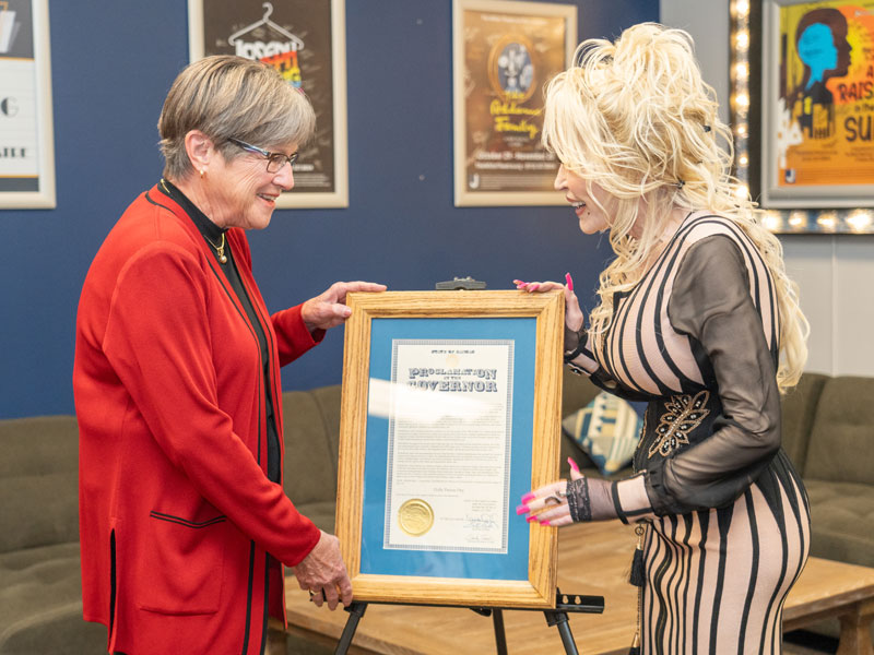 Photo from Dolly Parton’s visit to Kansas last August with Gov. Laura Kelly.